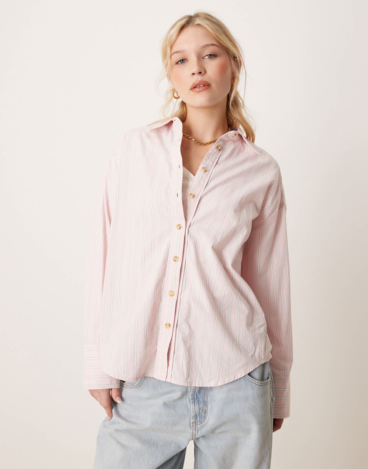 Free People striped varsity oversized shirt in light pink