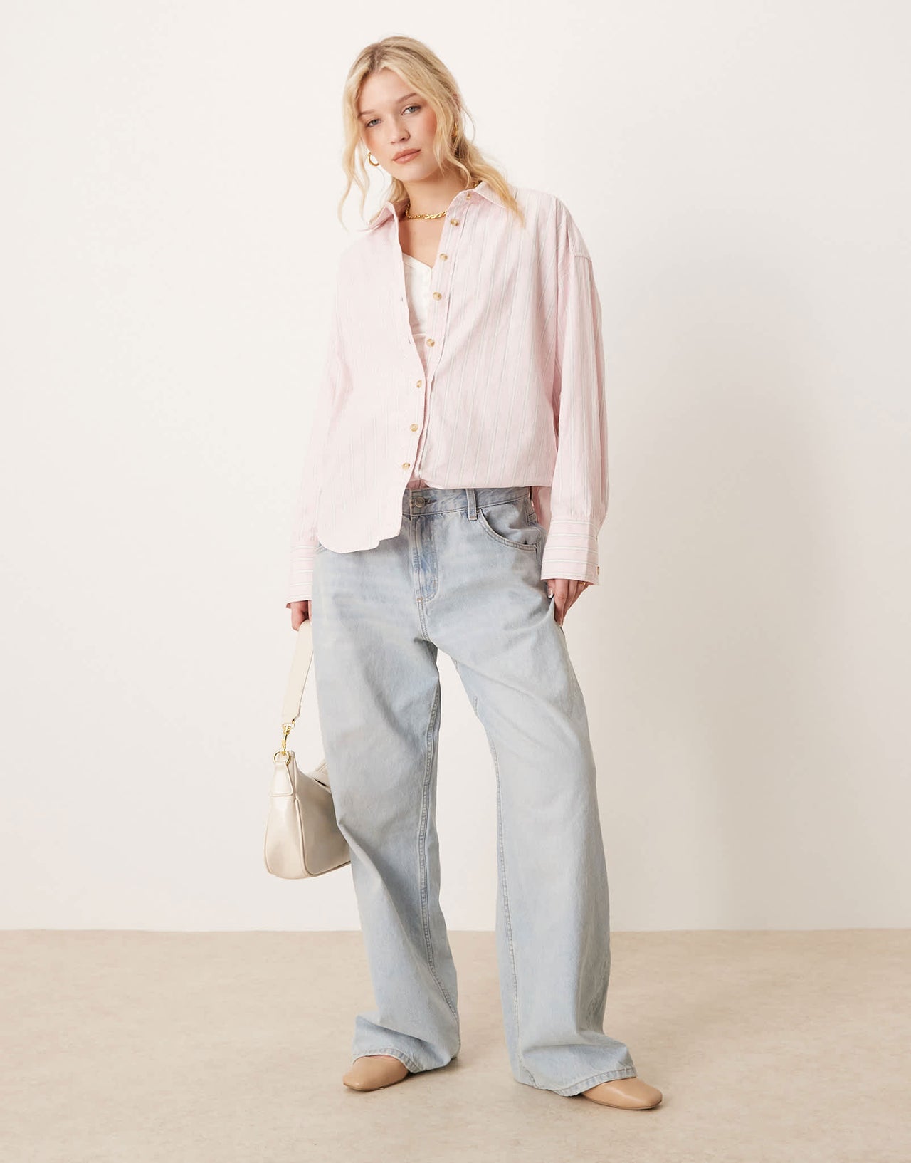 Free People striped varsity oversized shirt in light pink
