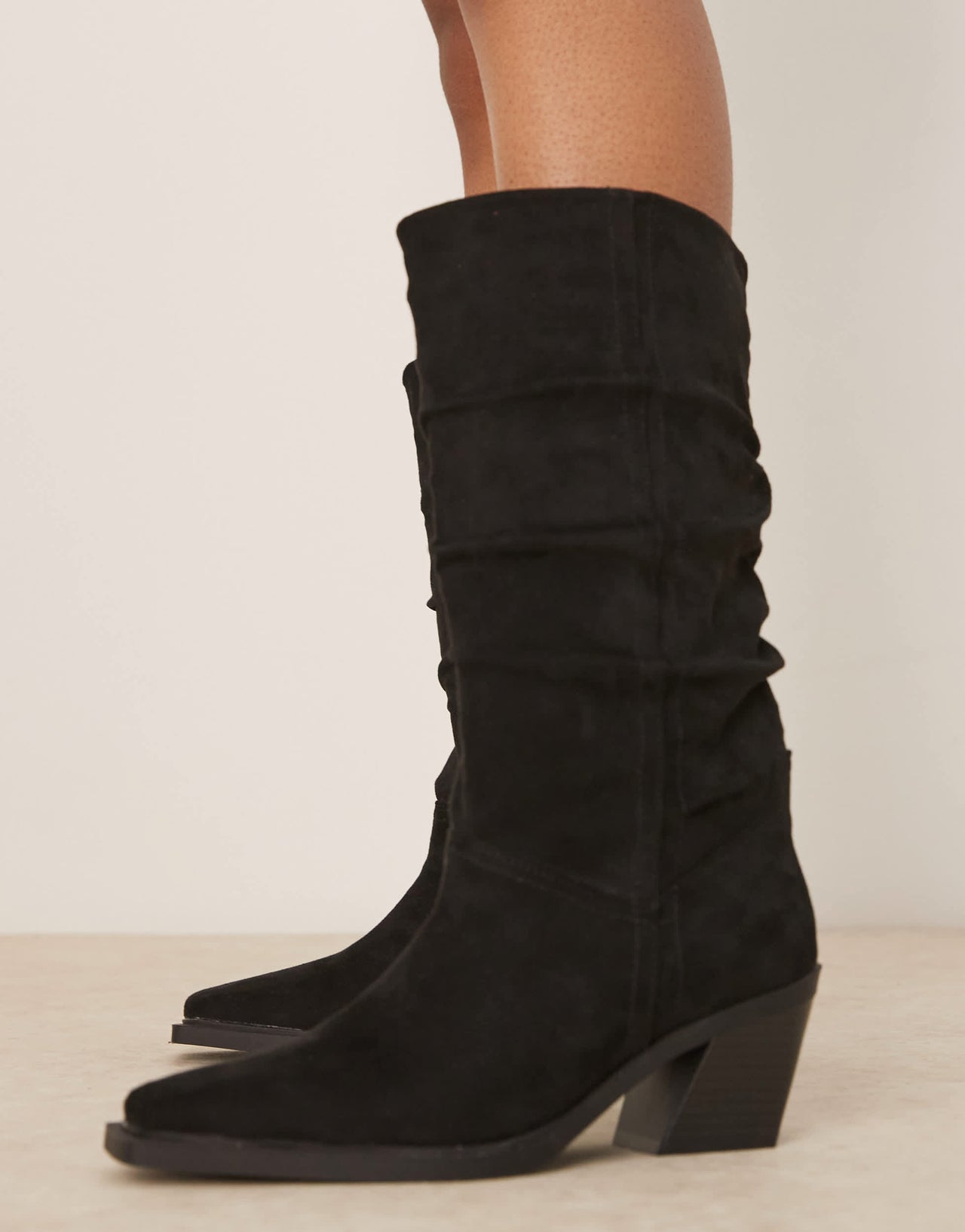 ASOS DESIGN Chosen slouchy western knee boots in black suedette