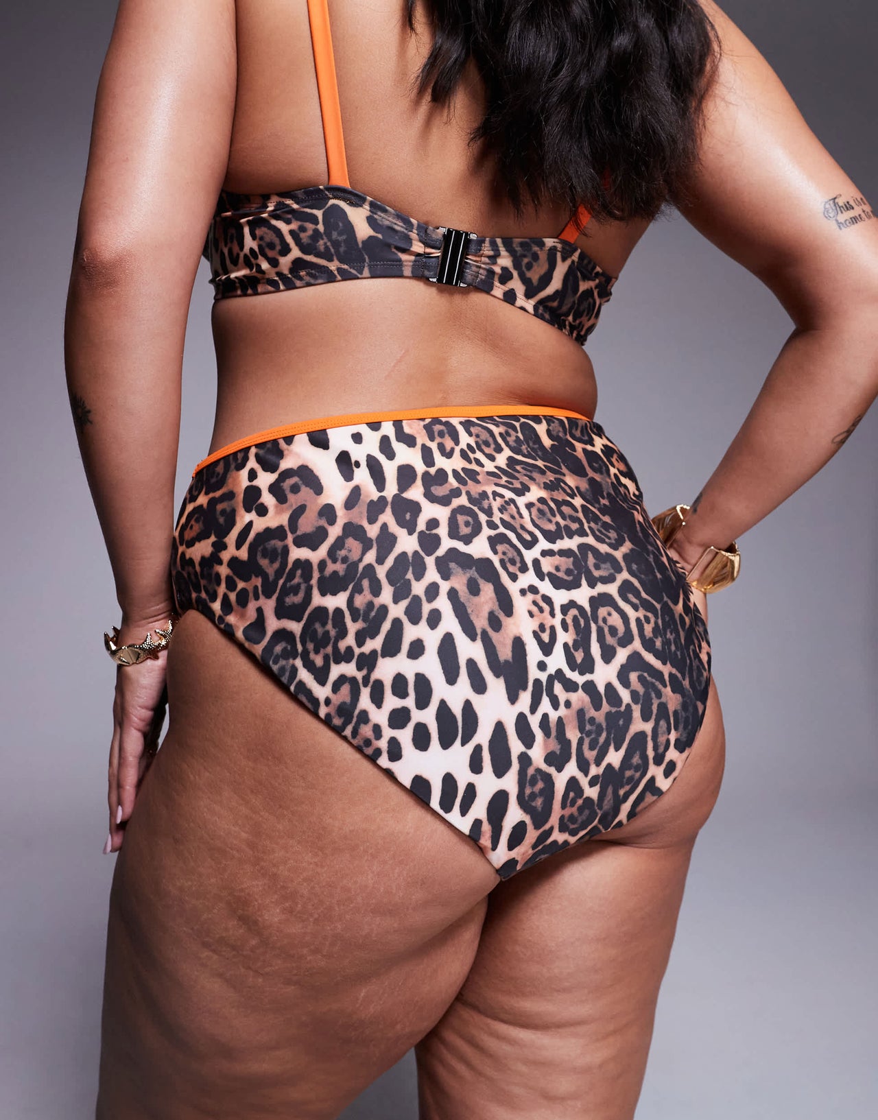ASOS DESIGN Curve Leo contrast binding bikini bottom in animal print