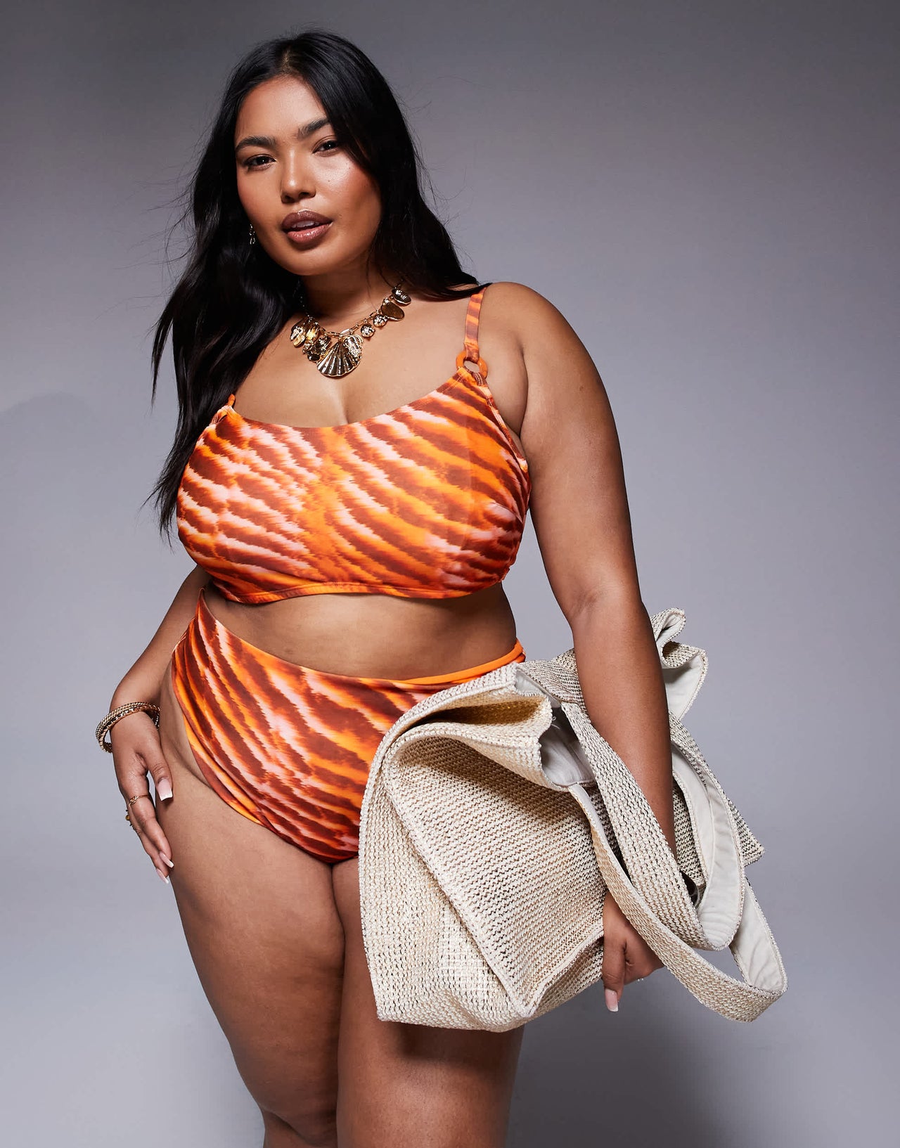 ASOS DESIGN Curve Charlie bikini top with hidden underwire in orange animal print