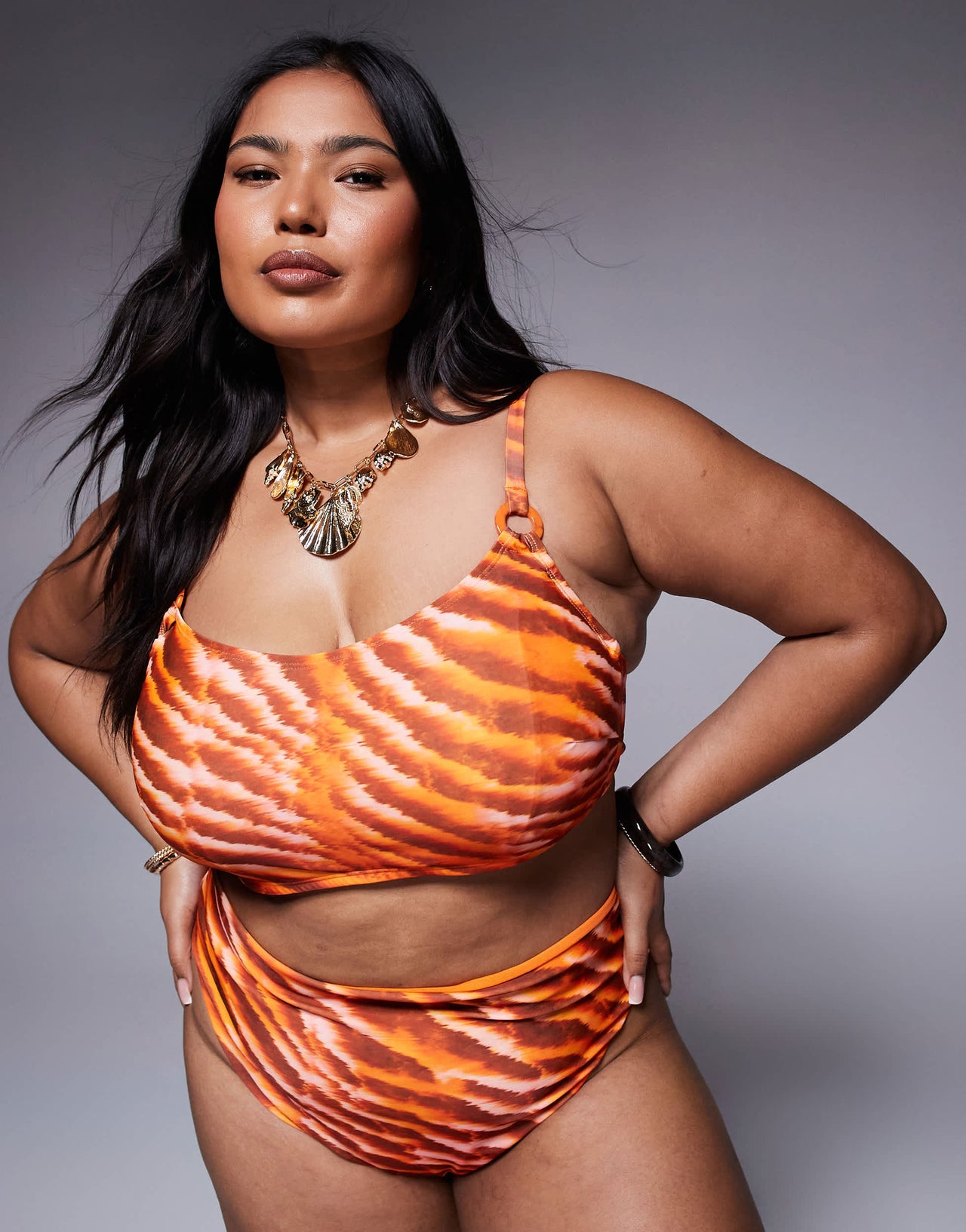 ASOS DESIGN Curve Charlie bikini top with hidden underwire in orange animal print