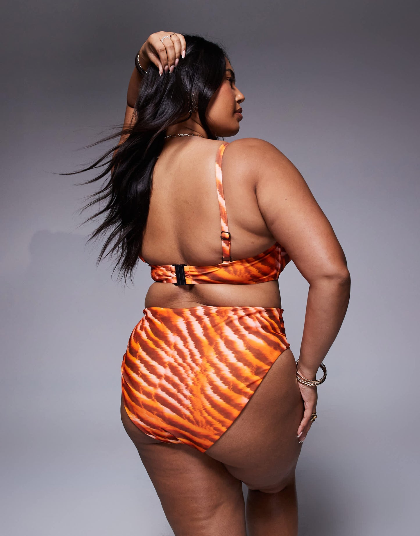 ASOS DESIGN Curve Charlie bikini top with hidden underwire in orange animal print