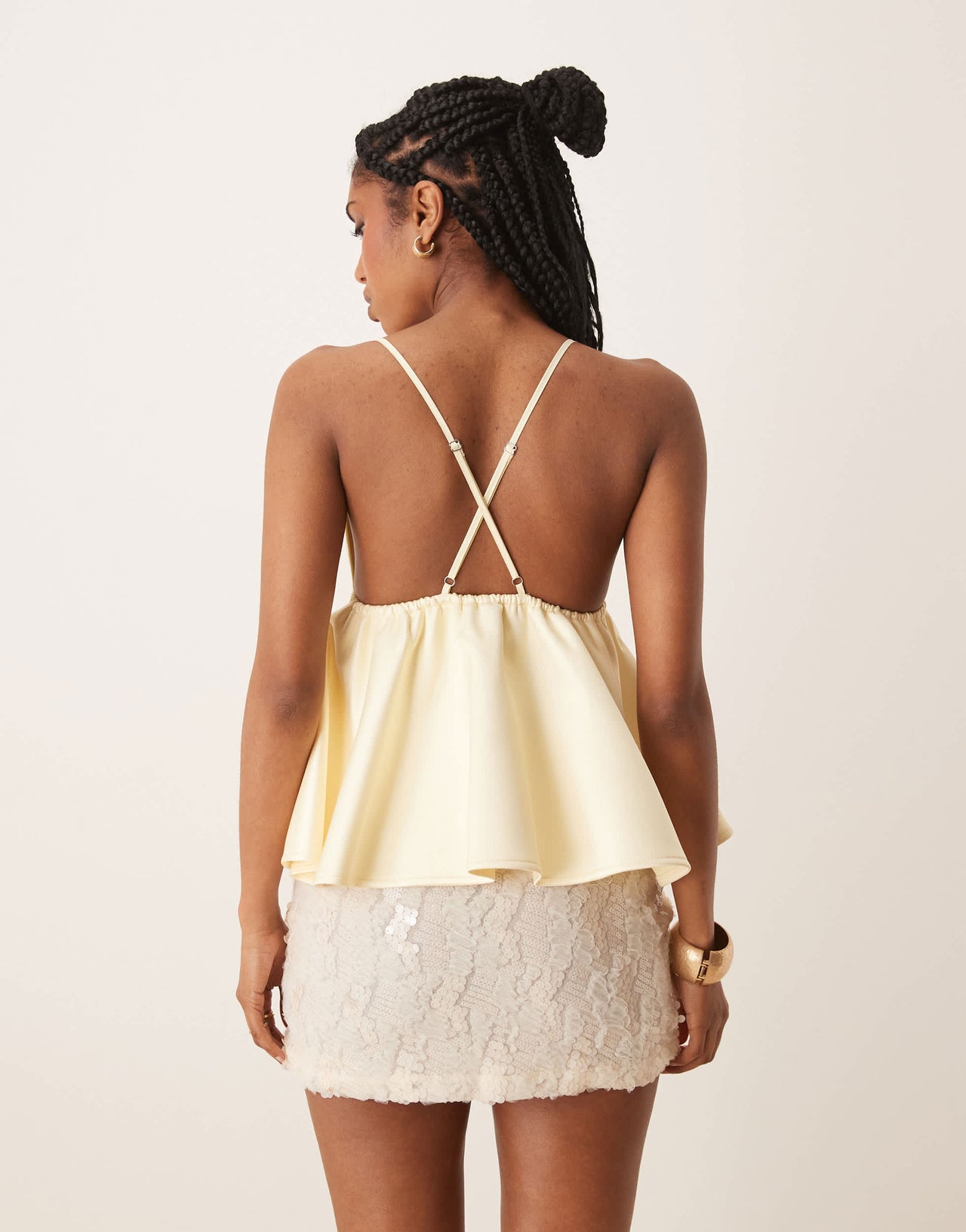ASOS DESIGN Premium sequin bust cami with satin peplum hem in lemon yellow