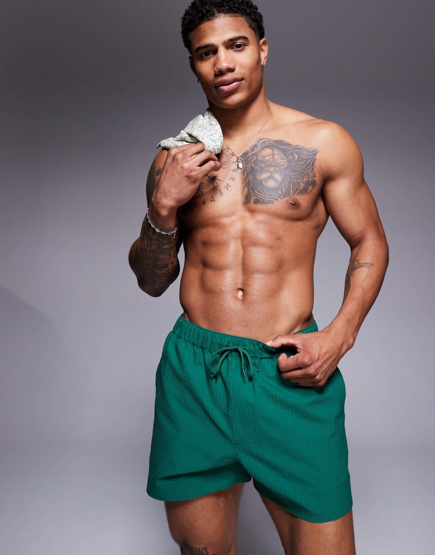 ASOS DESIGN seersucker swim shorts in short length in green