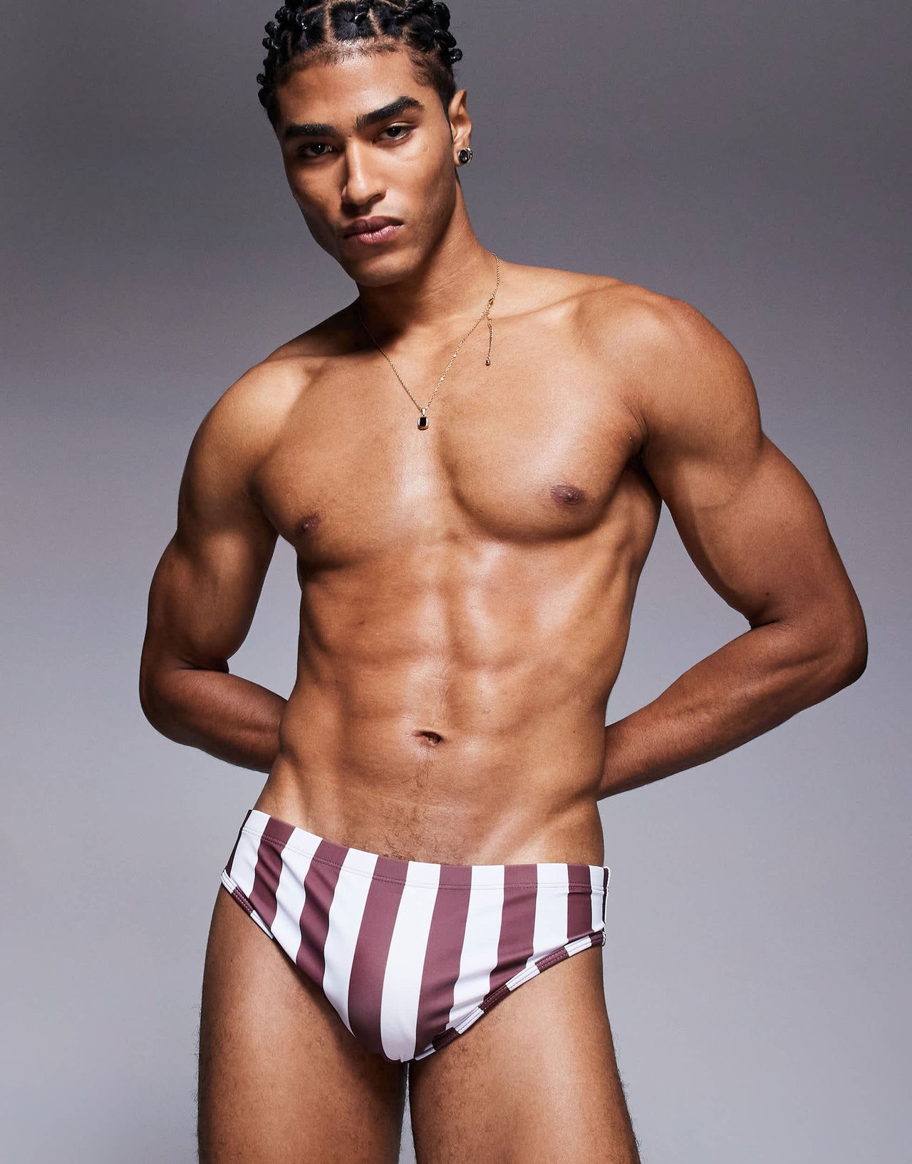 ASOS DESIGN swim brief in burgundy and white stripe