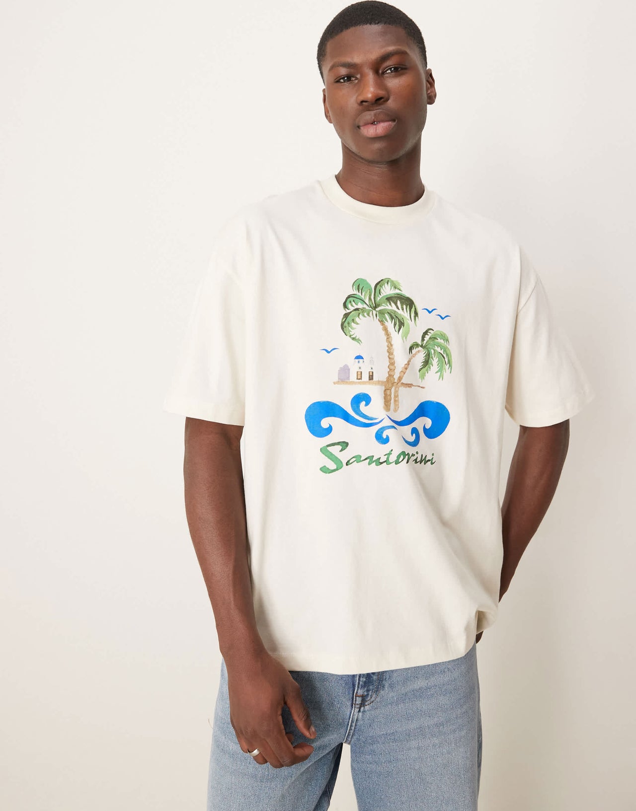 ASOS DESIGN oversized t-shirt with palm tree chest print in cream