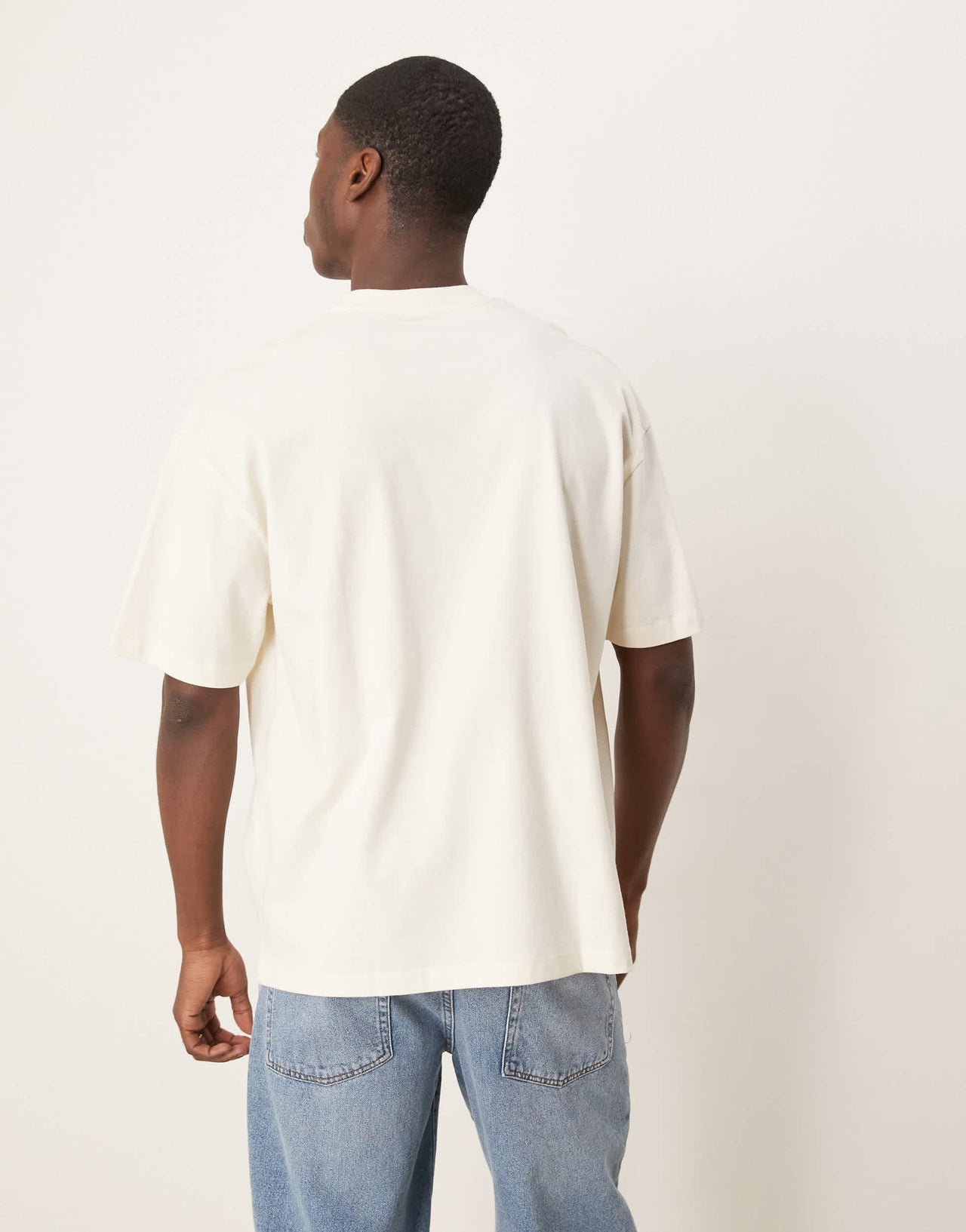 ASOS DESIGN oversized t-shirt with palm tree chest print in cream