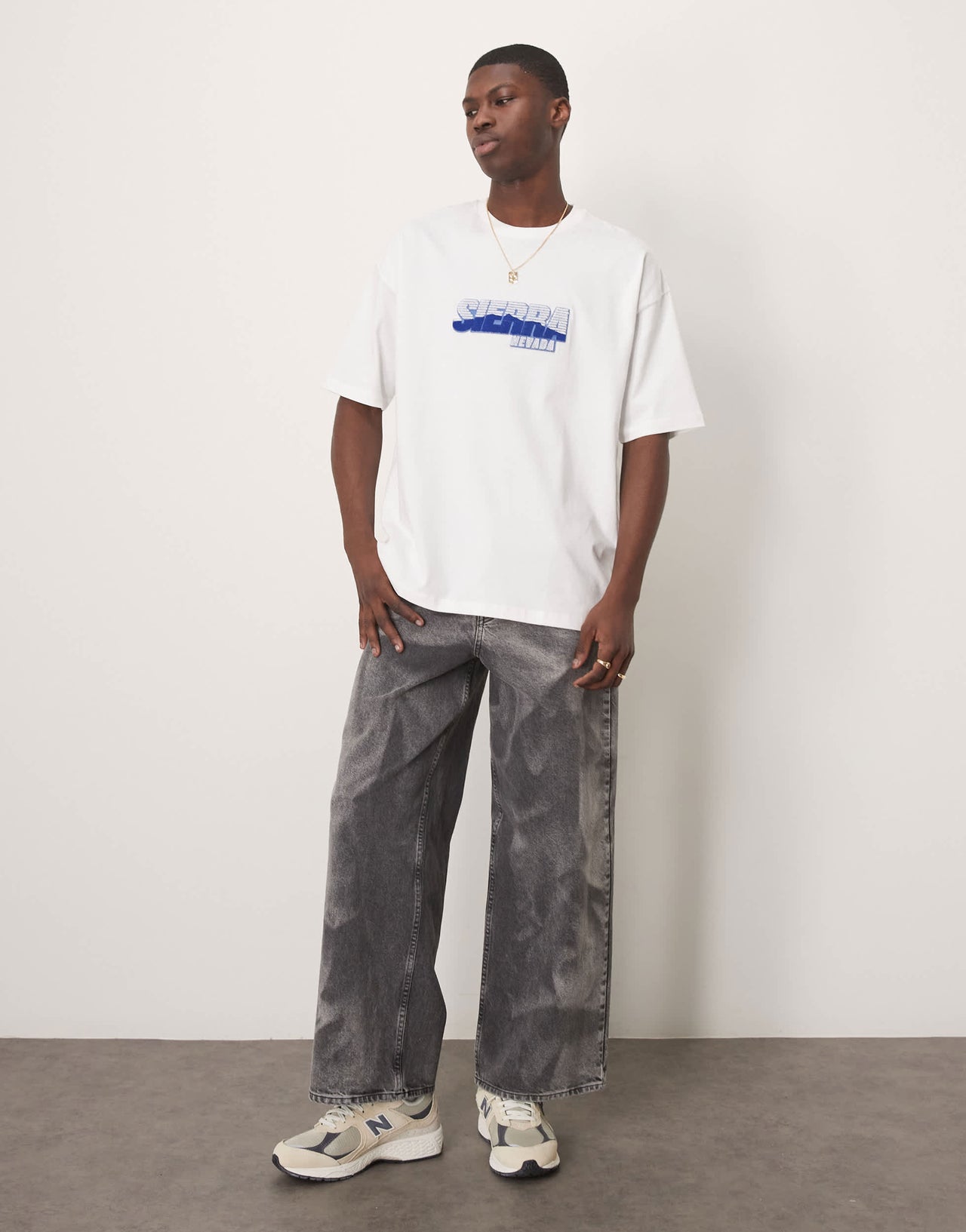 ASOS DESIGN oversized t-shirt with city chest graphic in white