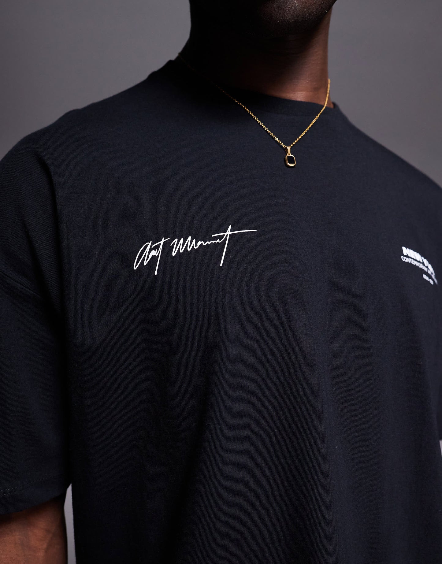 ASOS DESIGN oversized t-shirt with city text chest print in black