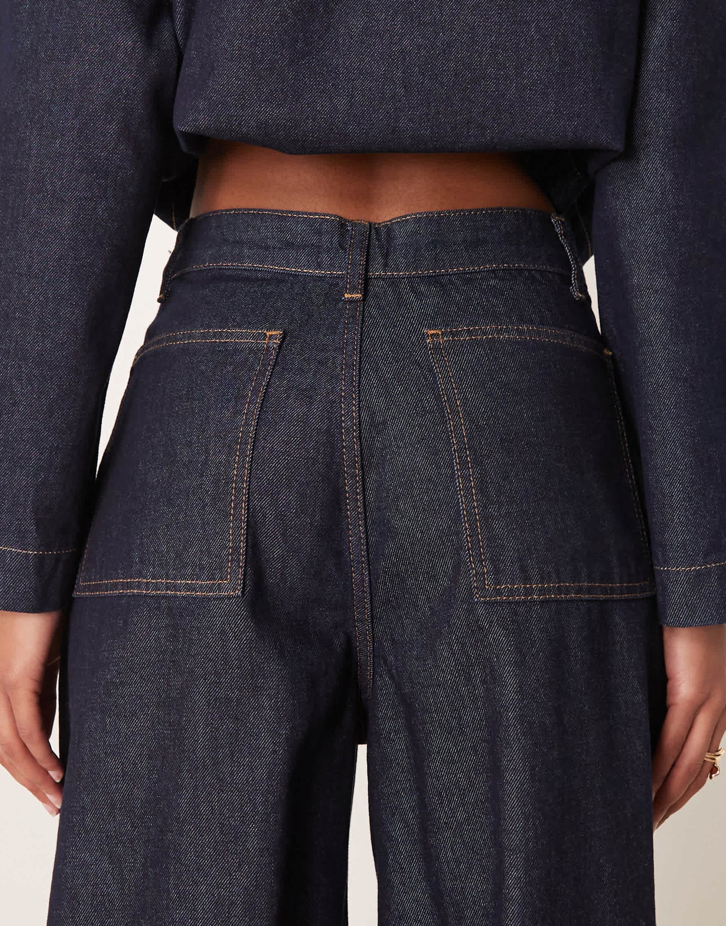ASOS DESIGN wide leg jean with pleats in dark indigo