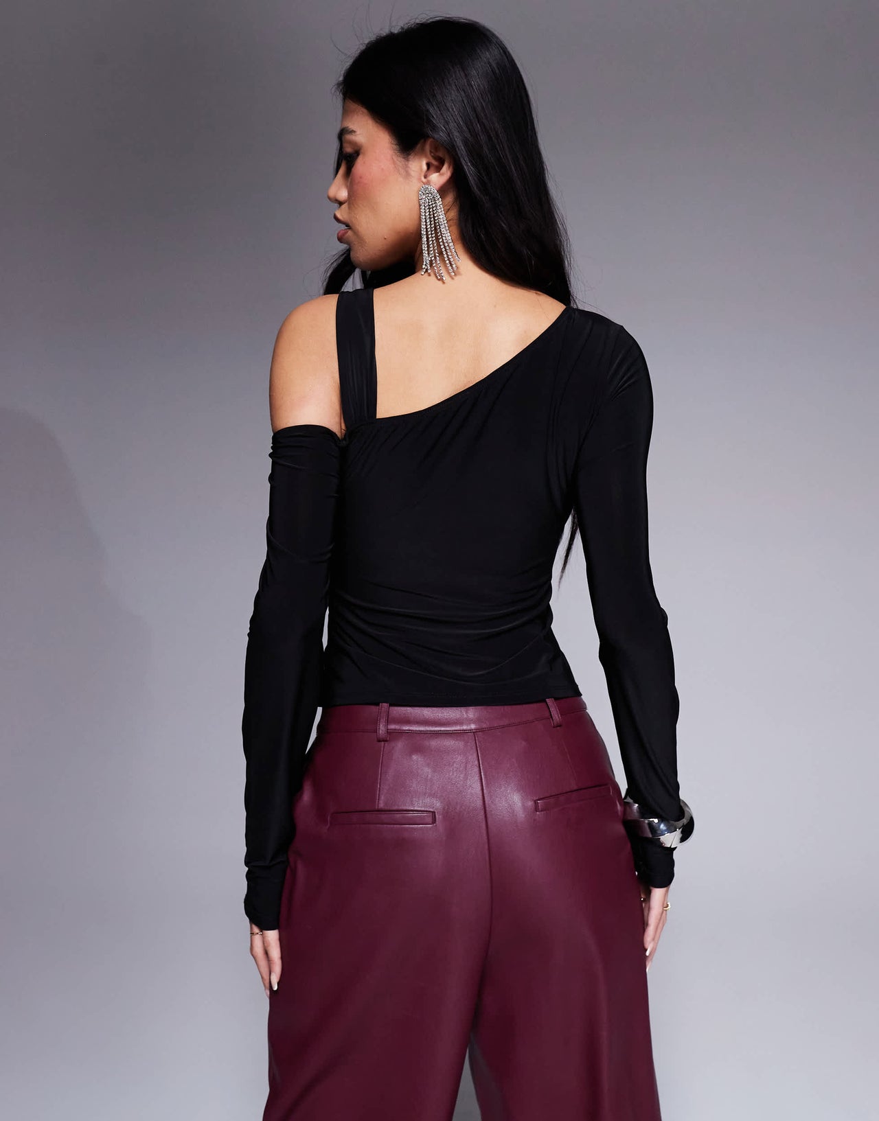 ASOS DESIGN slinky one shoulder twisted bust detail top in black