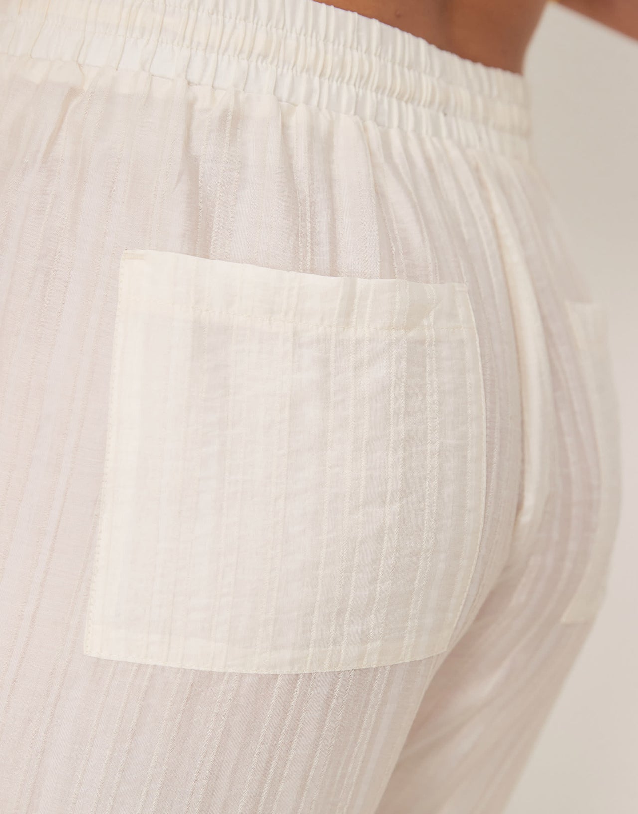 ASOS DESIGN Curve sheer textured wide leg trousers co-ord in off white