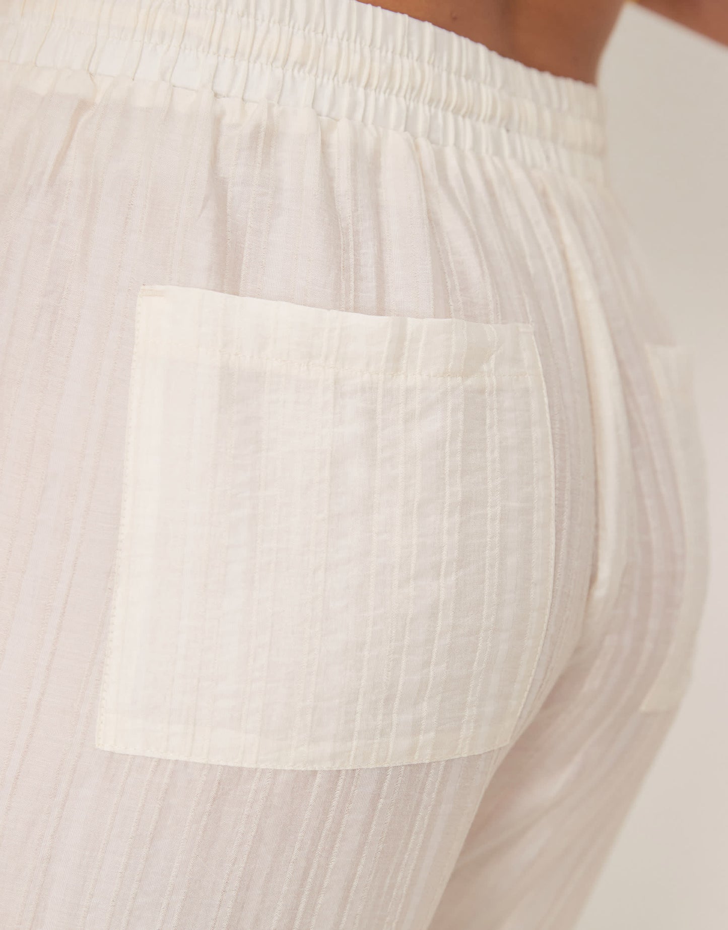 ASOS DESIGN Curve sheer textured wide leg trousers co-ord in off white