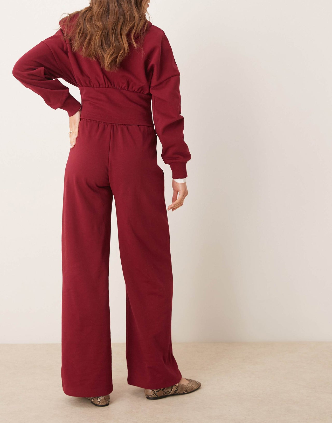 ASOS DESIGN v front waistband wide leg jogger in burgundy
