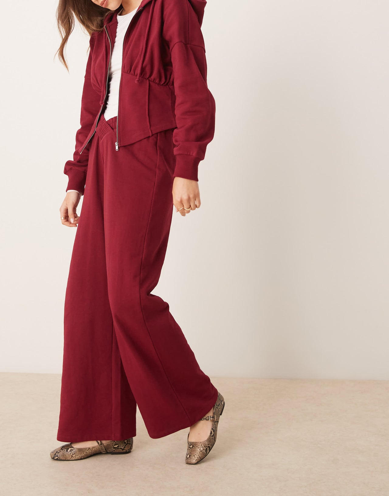 ASOS DESIGN v front waistband wide leg jogger in burgundy