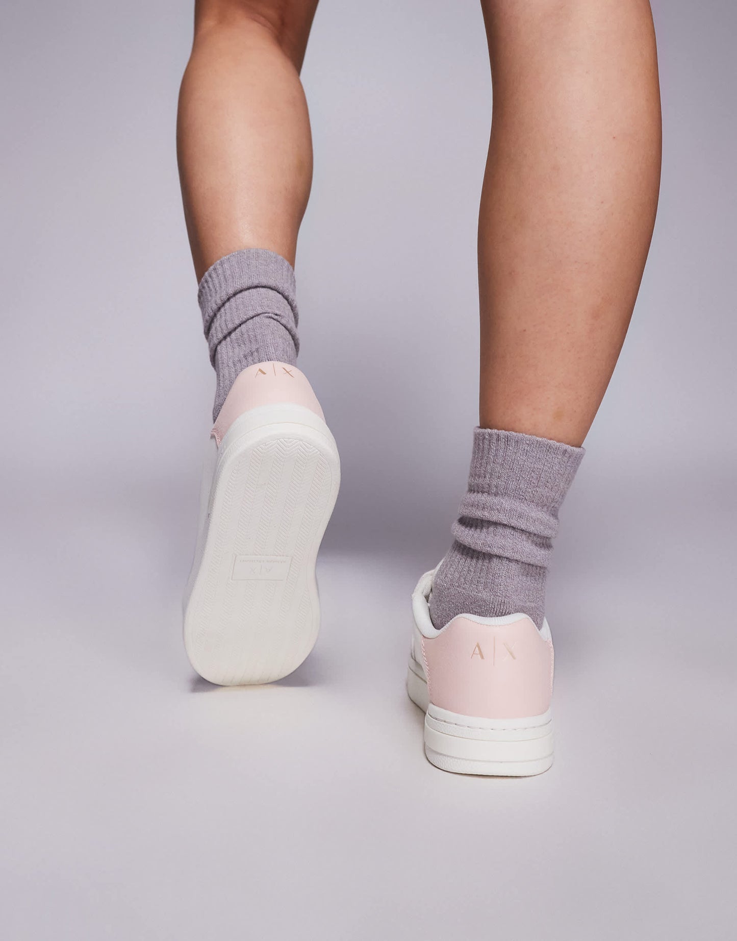 Armani Exchange logo trainers in off white and pink