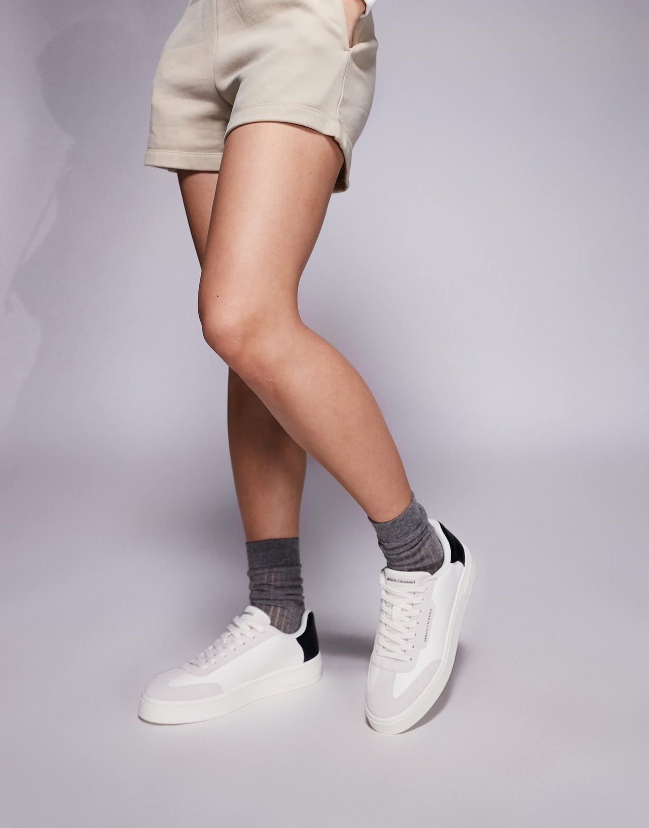Armani Exchange logo trainers in off white and black