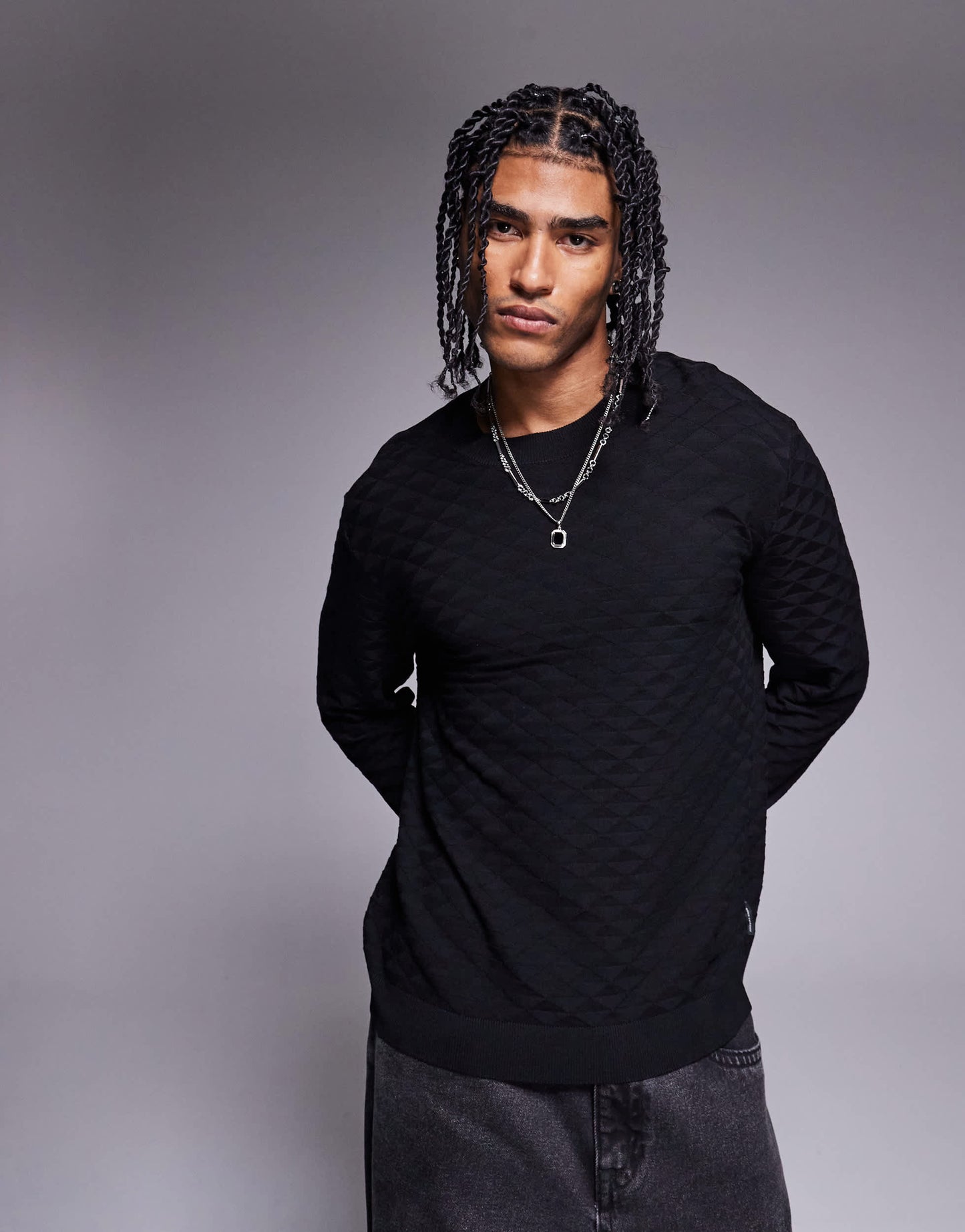 Armani Exchange crew neck textured logo jumper in black