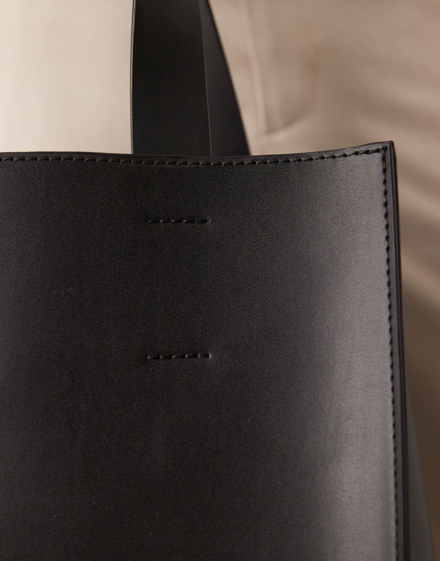 ASOS DESIGN faux leather tote bag with crossbody strap in black