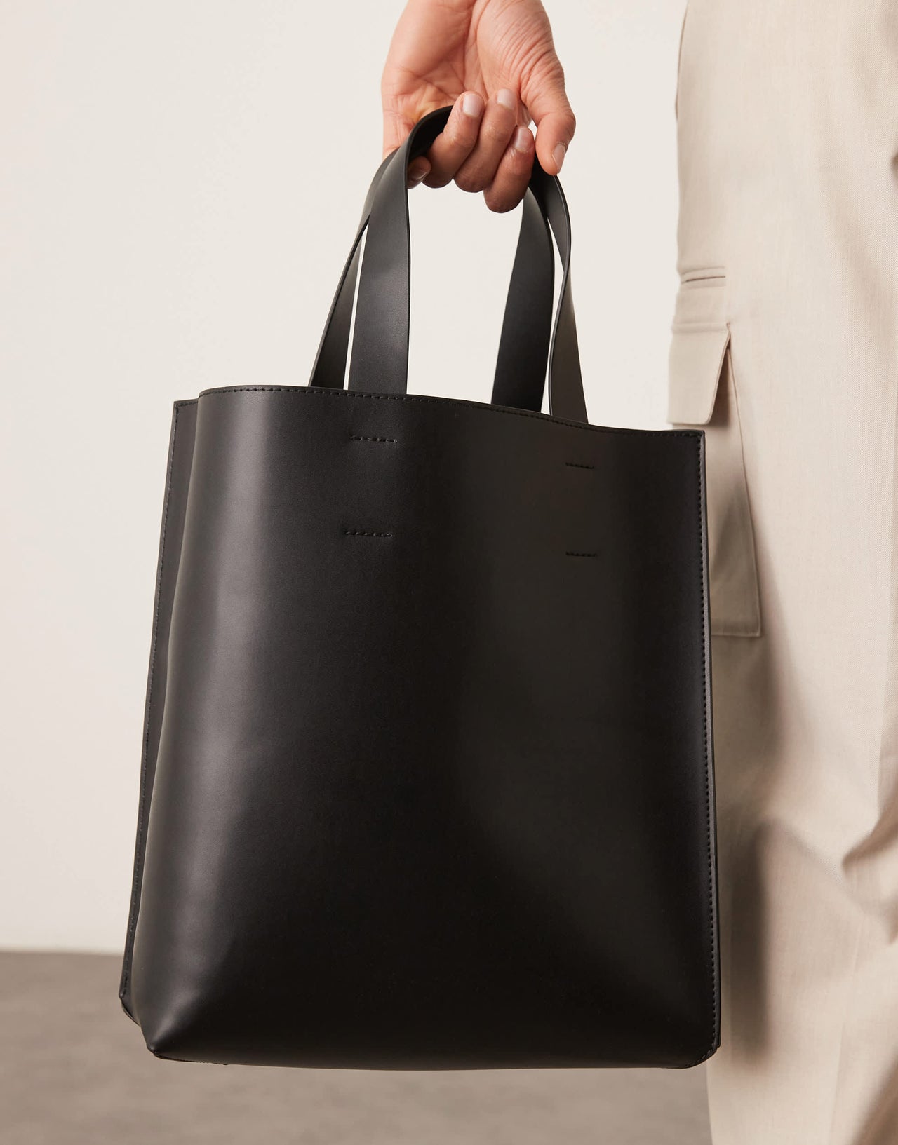 ASOS DESIGN faux leather tote bag with crossbody strap in black