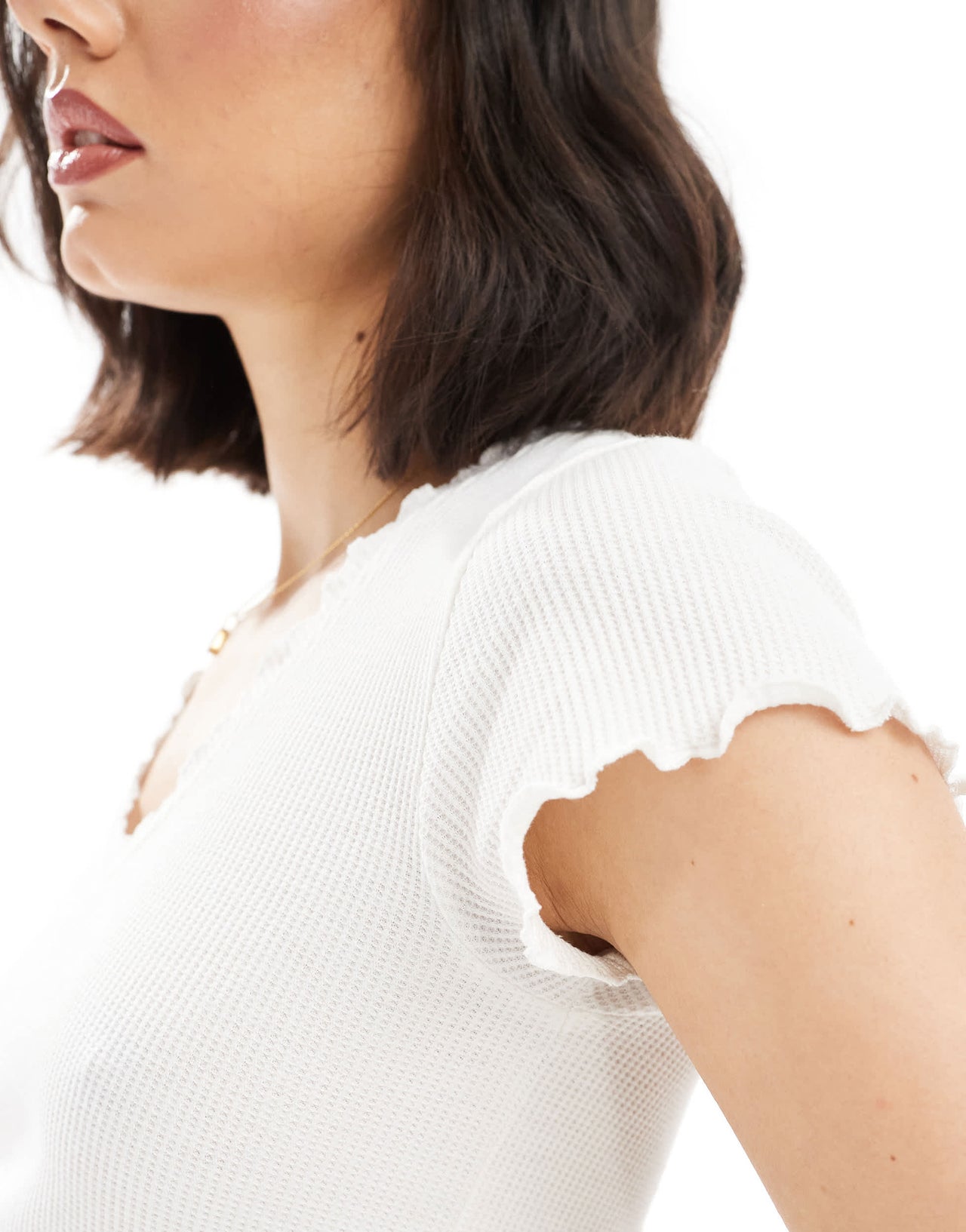 ASOS DESIGN waffle v neck t-shirt with overlock trim in cream