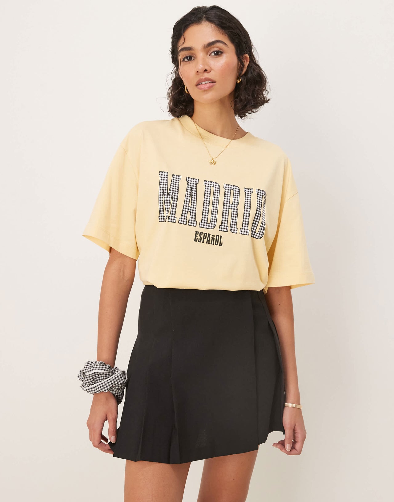 ASOS DESIGN oversized t-shirt with madrid graphic in black gingham in yellow