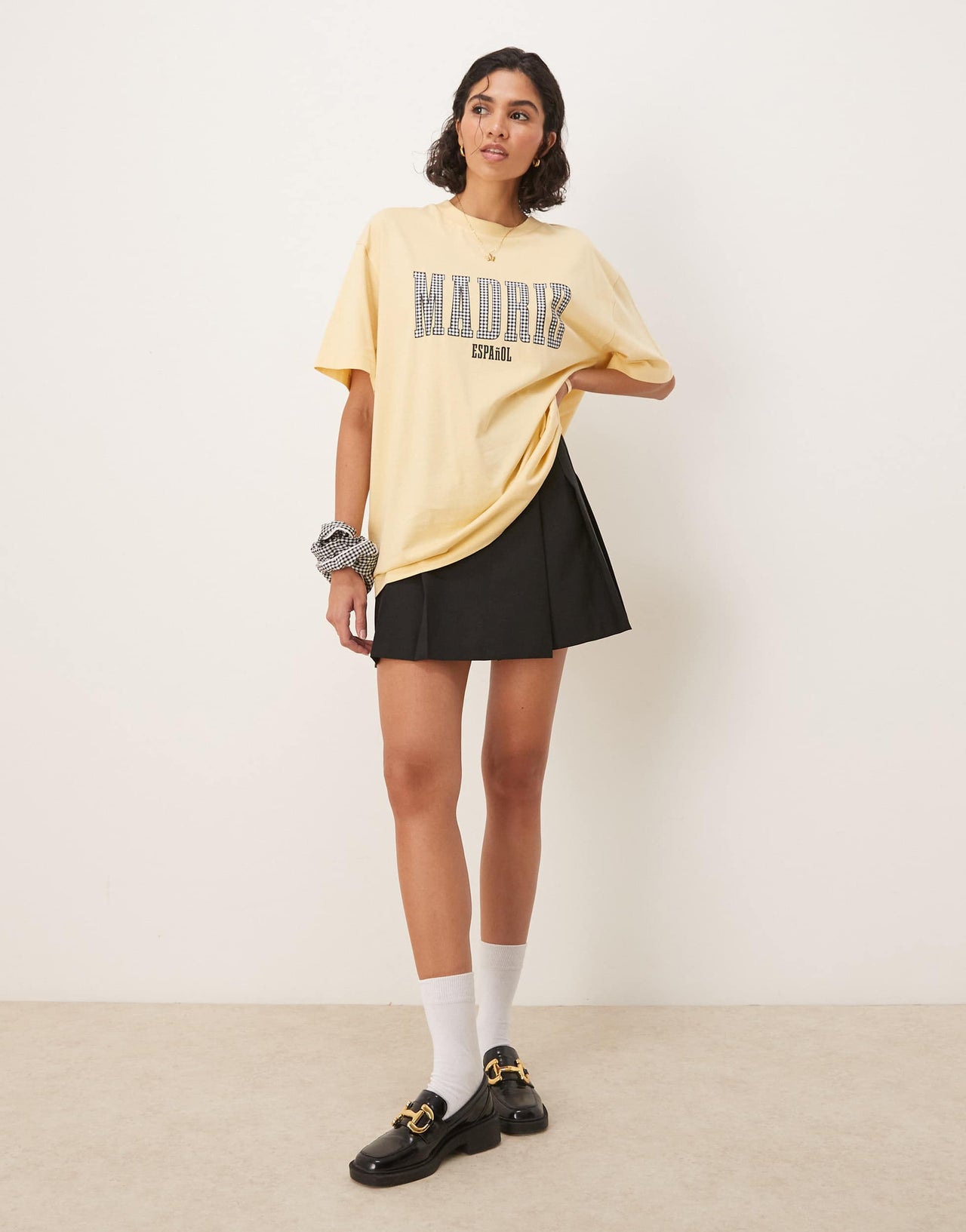 ASOS DESIGN oversized t-shirt with madrid graphic in black gingham in yellow