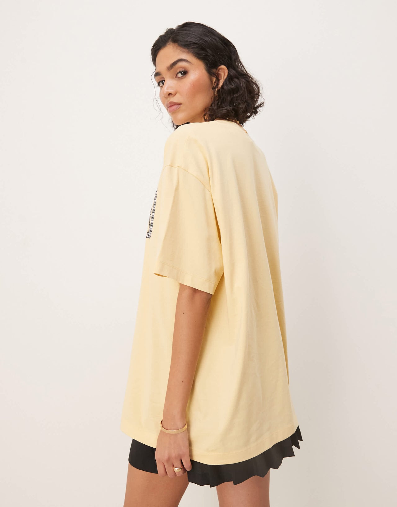 ASOS DESIGN oversized t-shirt with madrid graphic in black gingham in yellow