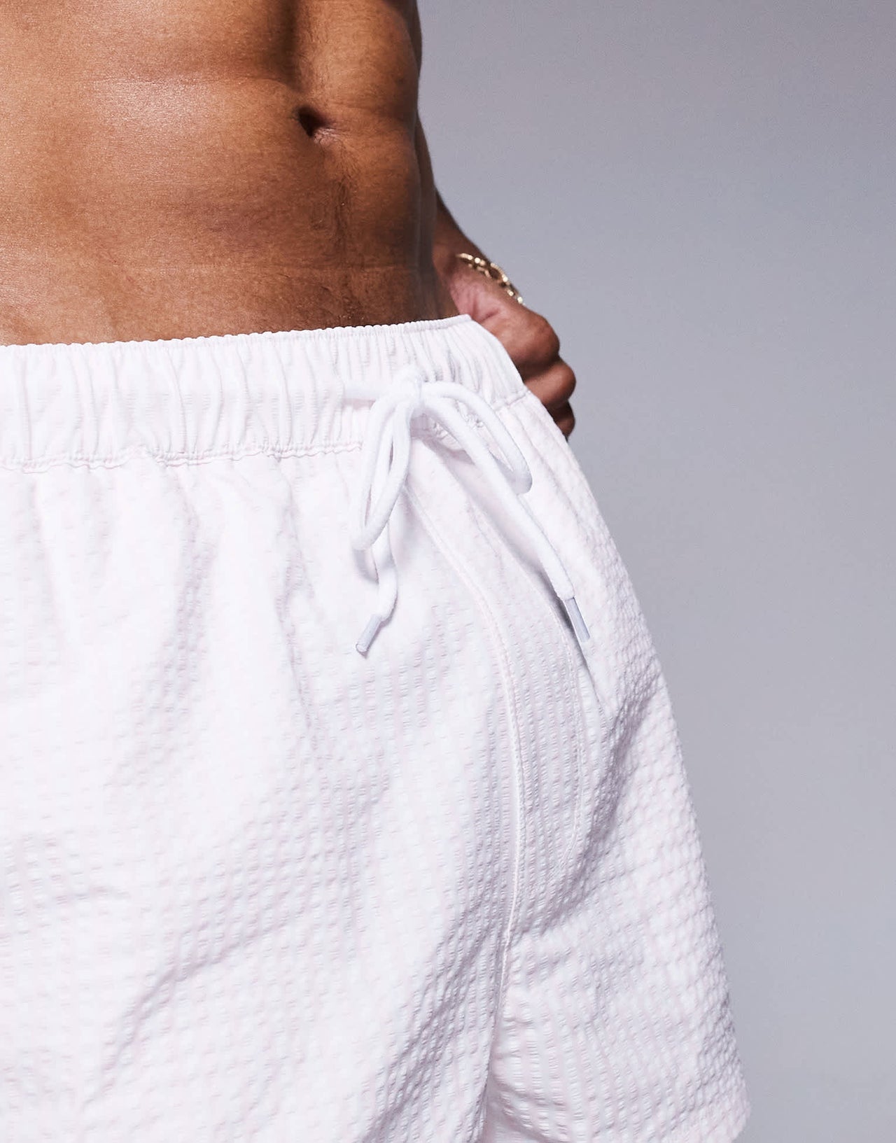 ASOS DESIGN seersucker swim short in super short length in pink
