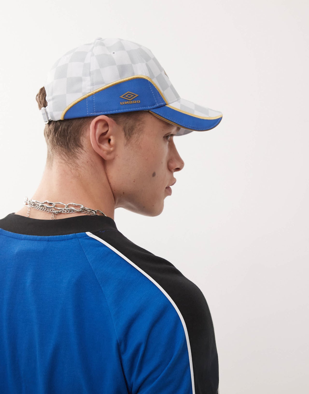 Umbro panelled logo cap in white and gold