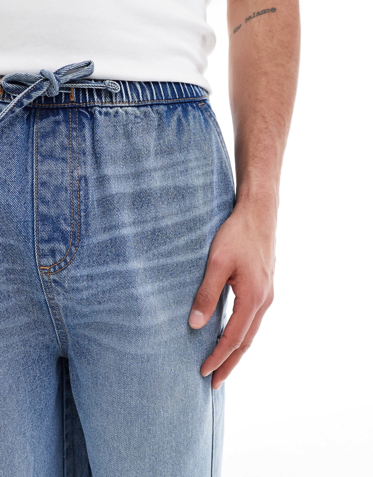ASOS DESIGN longer length denim jort in mid wash blue with cargo pocket details