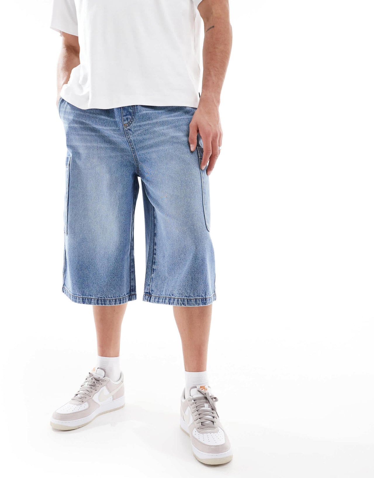 ASOS DESIGN longer length denim jort in mid wash blue with cargo pocket details