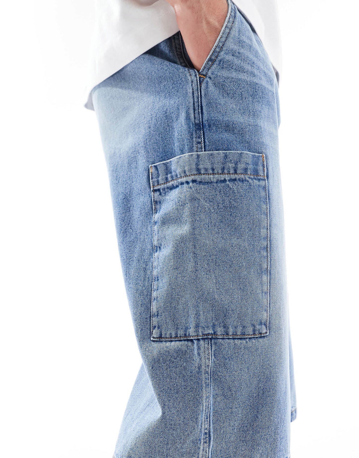 ASOS DESIGN longer length denim jort in mid wash blue with cargo pocket details
