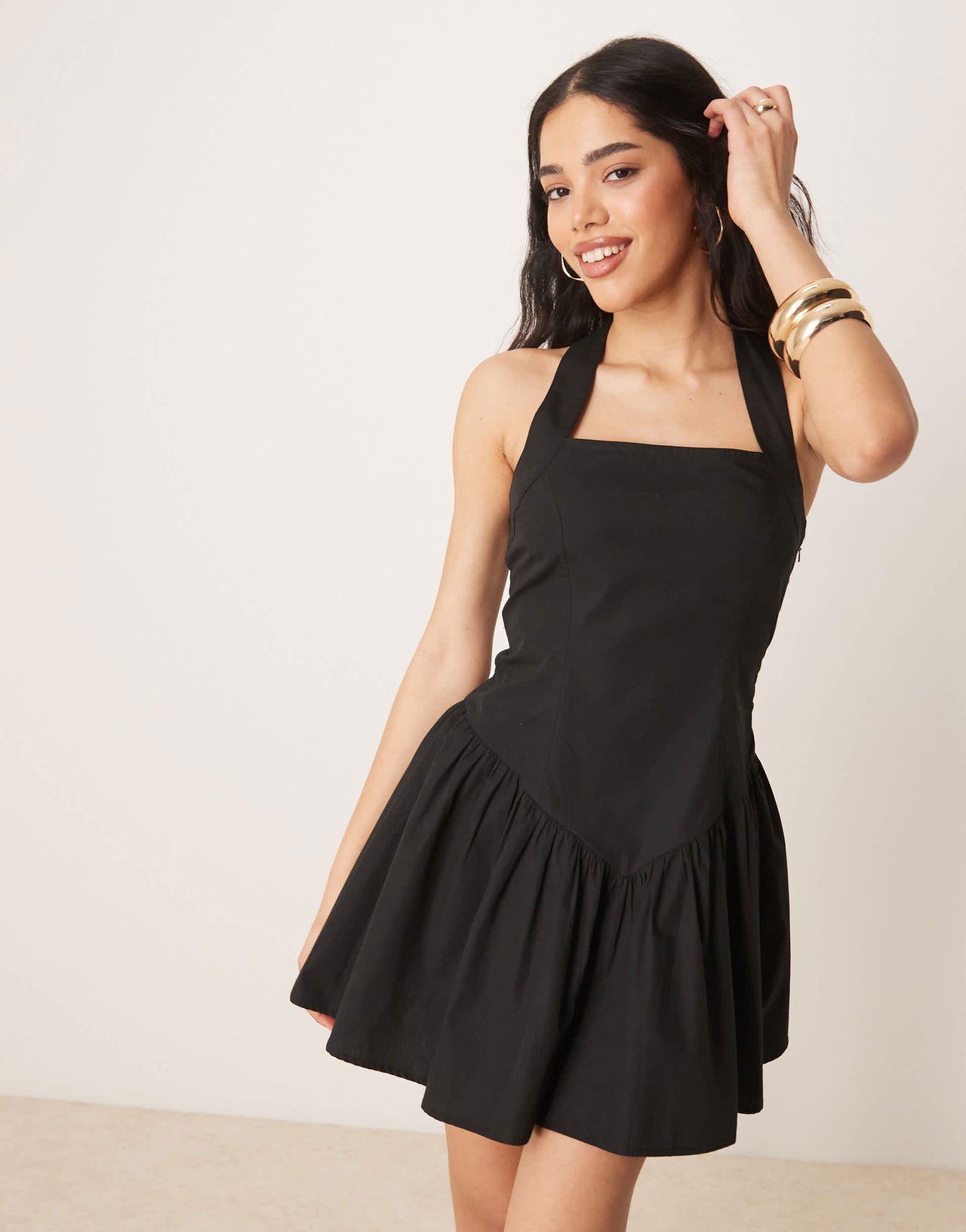 ASOS DESIGN halter mini sundress with ruffle hem in black