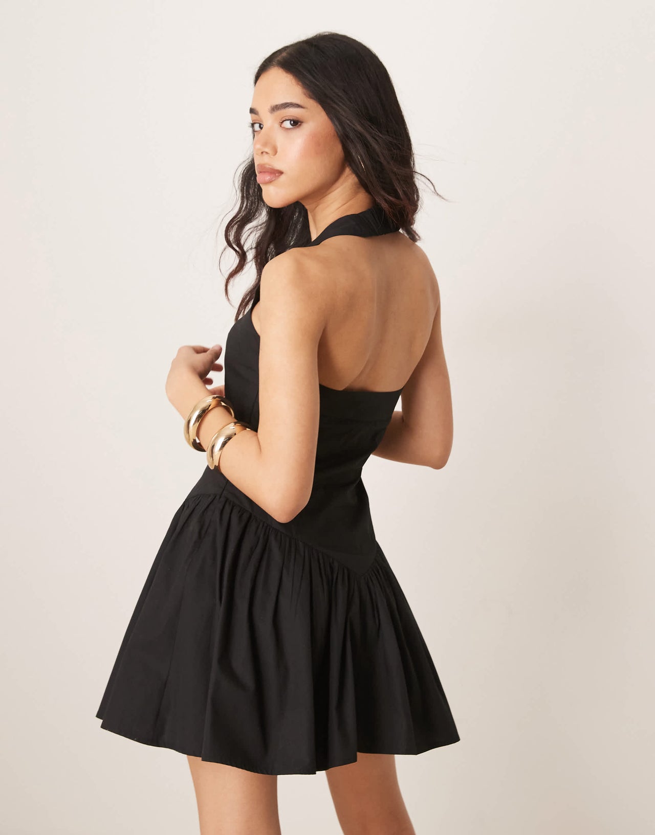 ASOS DESIGN halter mini sundress with ruffle hem in black
