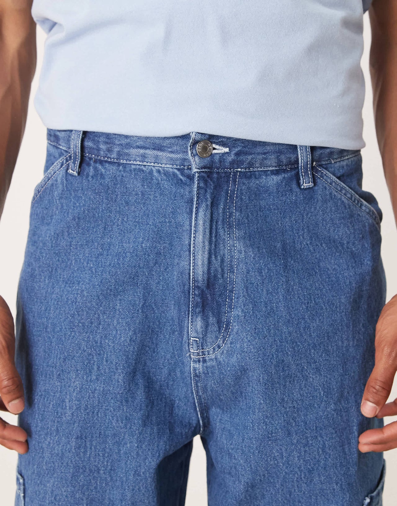 ASOS DESIGN wide skater jeans with cargo pockets in mid wash blue