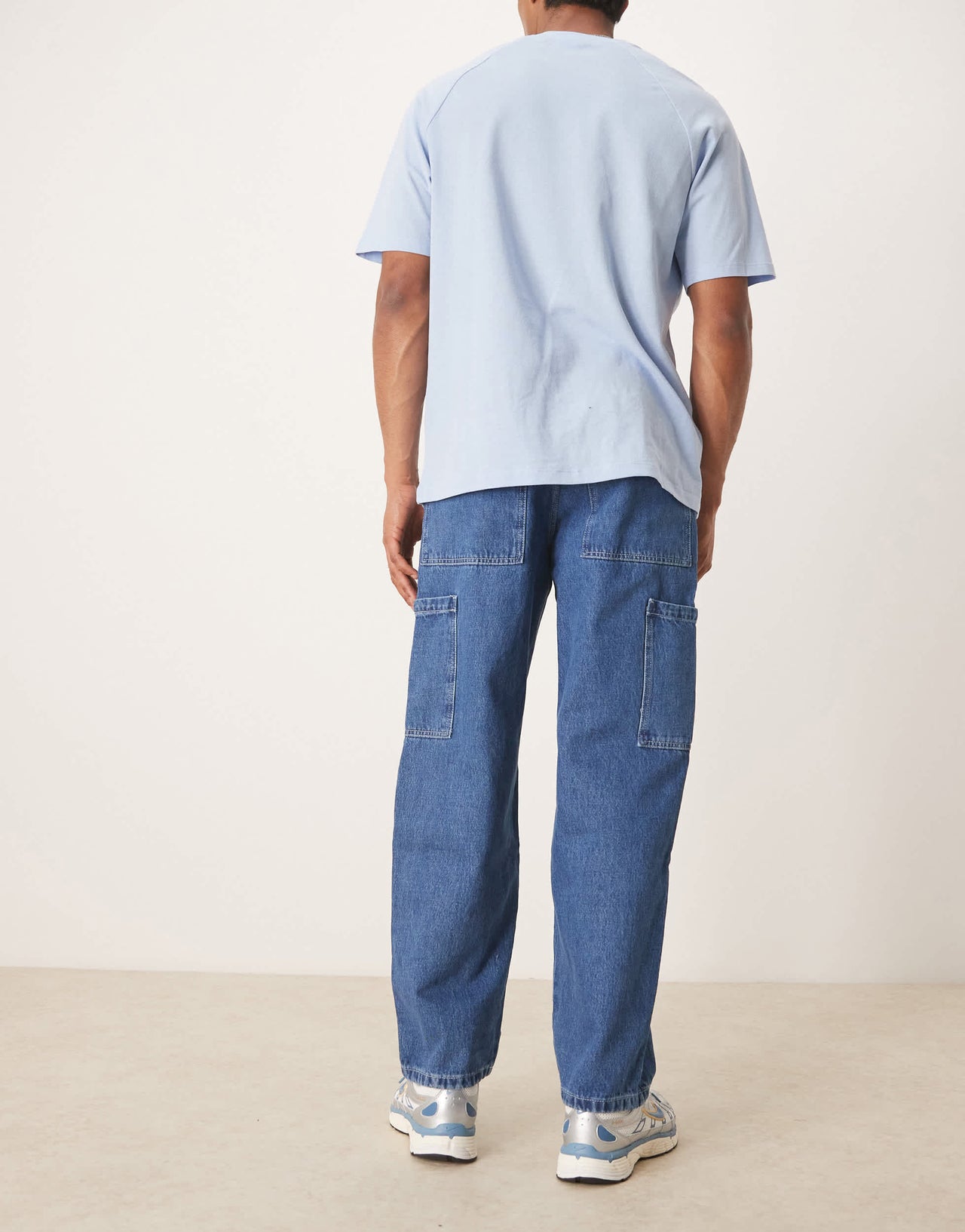 ASOS DESIGN wide skater jeans with cargo pockets in mid wash blue
