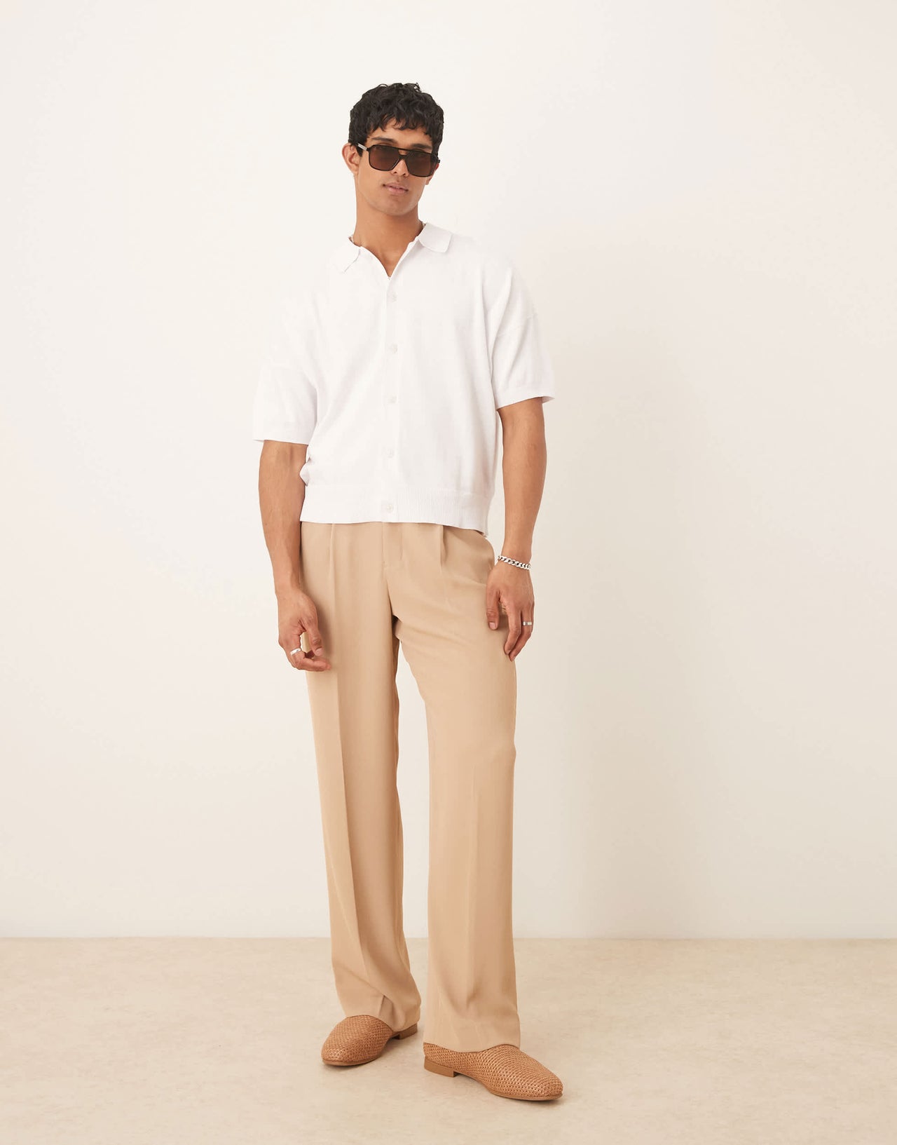 ASOS DESIGN oversized knitted cotton button through polo in white
