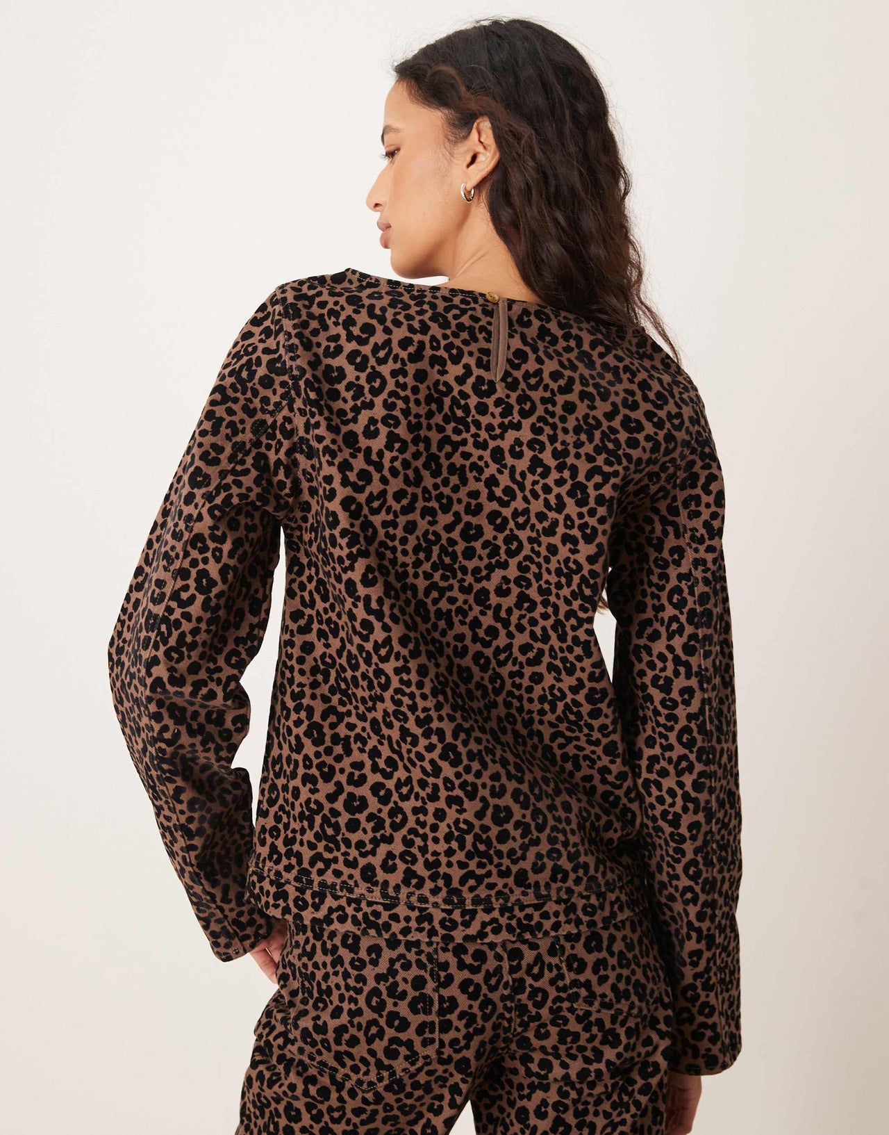 ASOS DESIGN flocked denim long sleeve top in dark leopard print