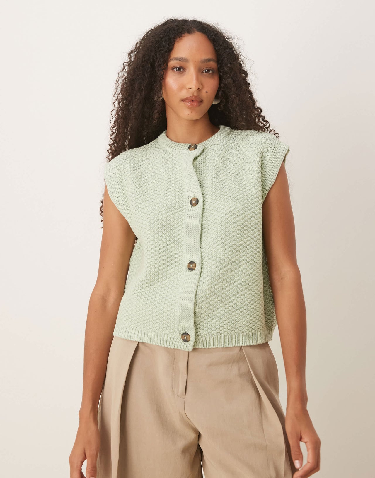 ASOS DESIGN boxy knitted stitch waistcoat with button detail in pistachio