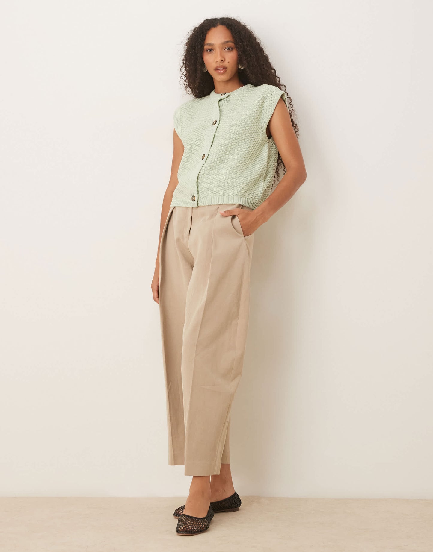 ASOS DESIGN boxy knitted stitch waistcoat with button detail in pistachio