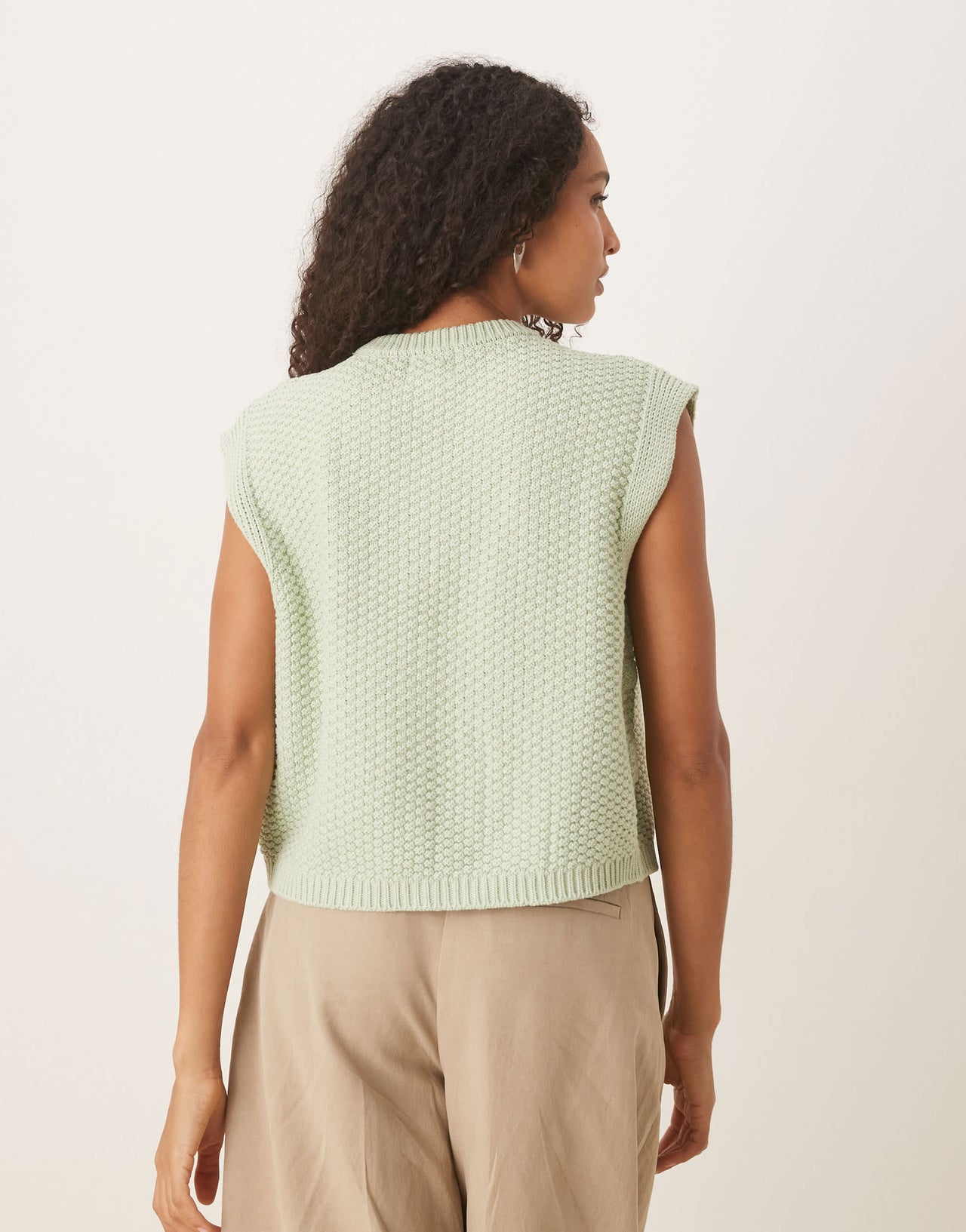ASOS DESIGN boxy knitted stitch waistcoat with button detail in pistachio