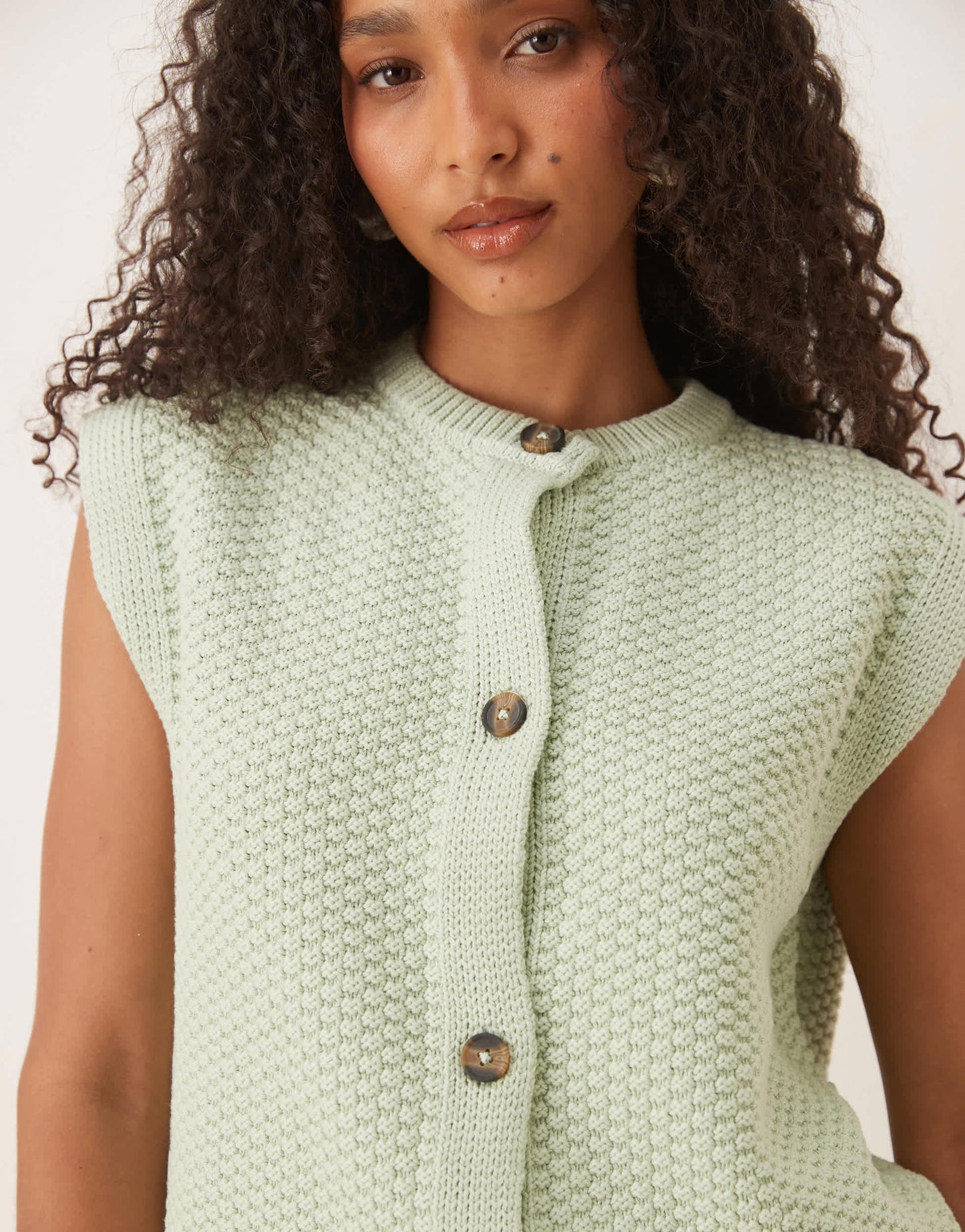 ASOS DESIGN boxy knitted stitch waistcoat with button detail in pistachio
