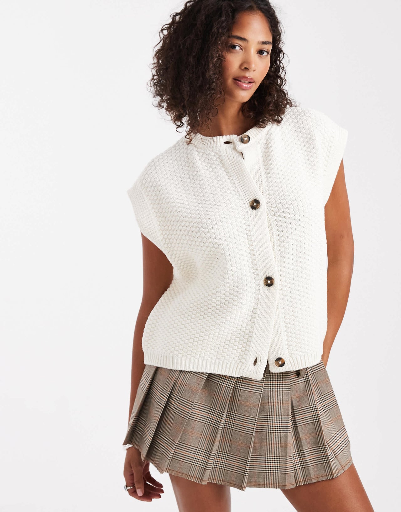 ASOS DESIGN boxy knitted stitch waistcoat with button detail in cream
