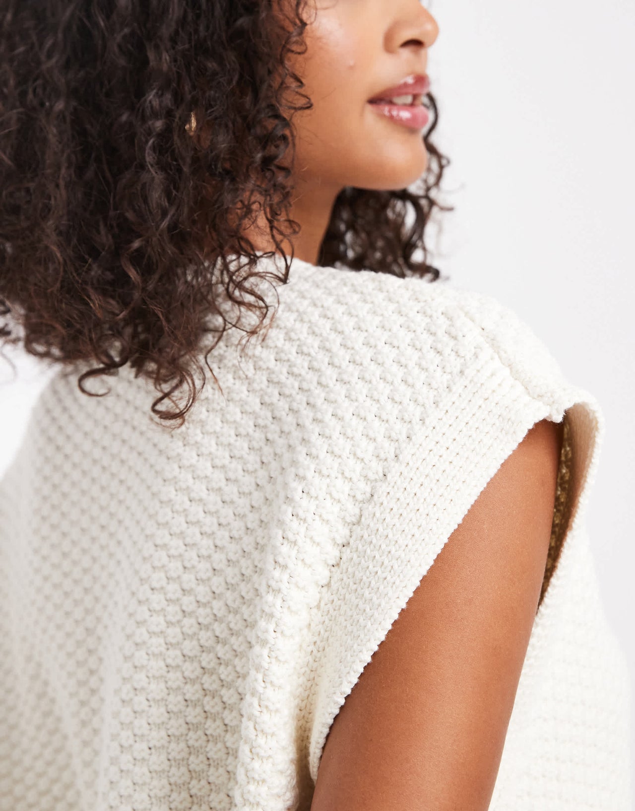 ASOS DESIGN boxy knitted stitch waistcoat with button detail in cream