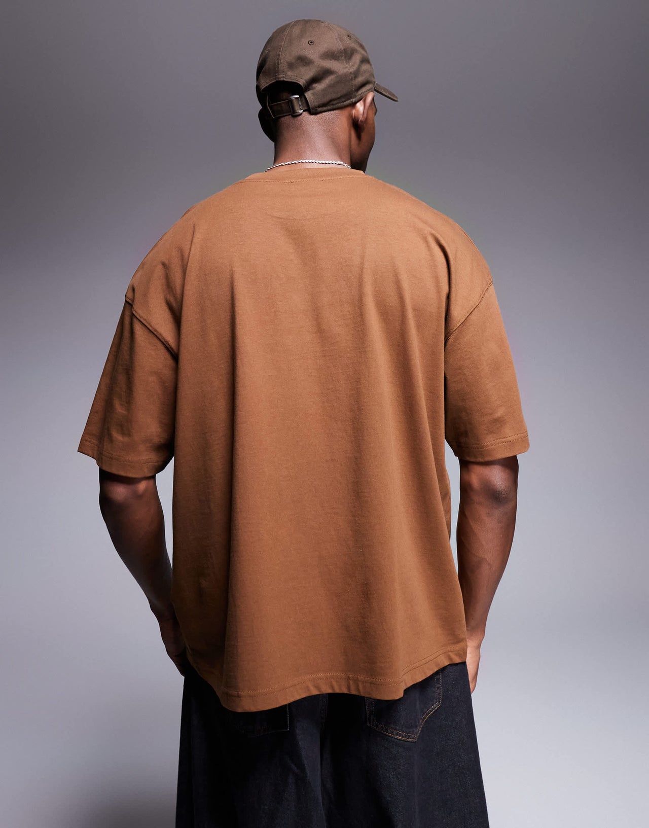 ASOS DESIGN oversized t-shirt with city graphic in brown