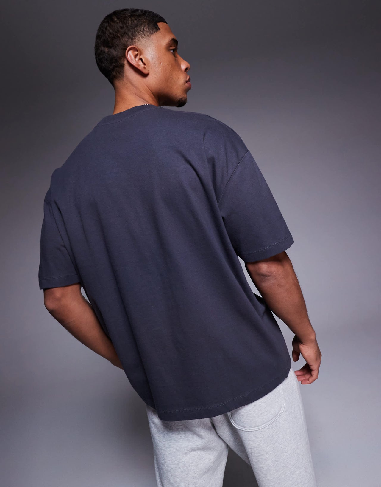 ASOS DESIGN oversized t-shirt with sports graphic in charcoal