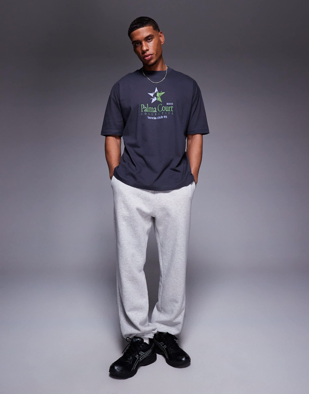 ASOS DESIGN oversized t-shirt with sports graphic in charcoal