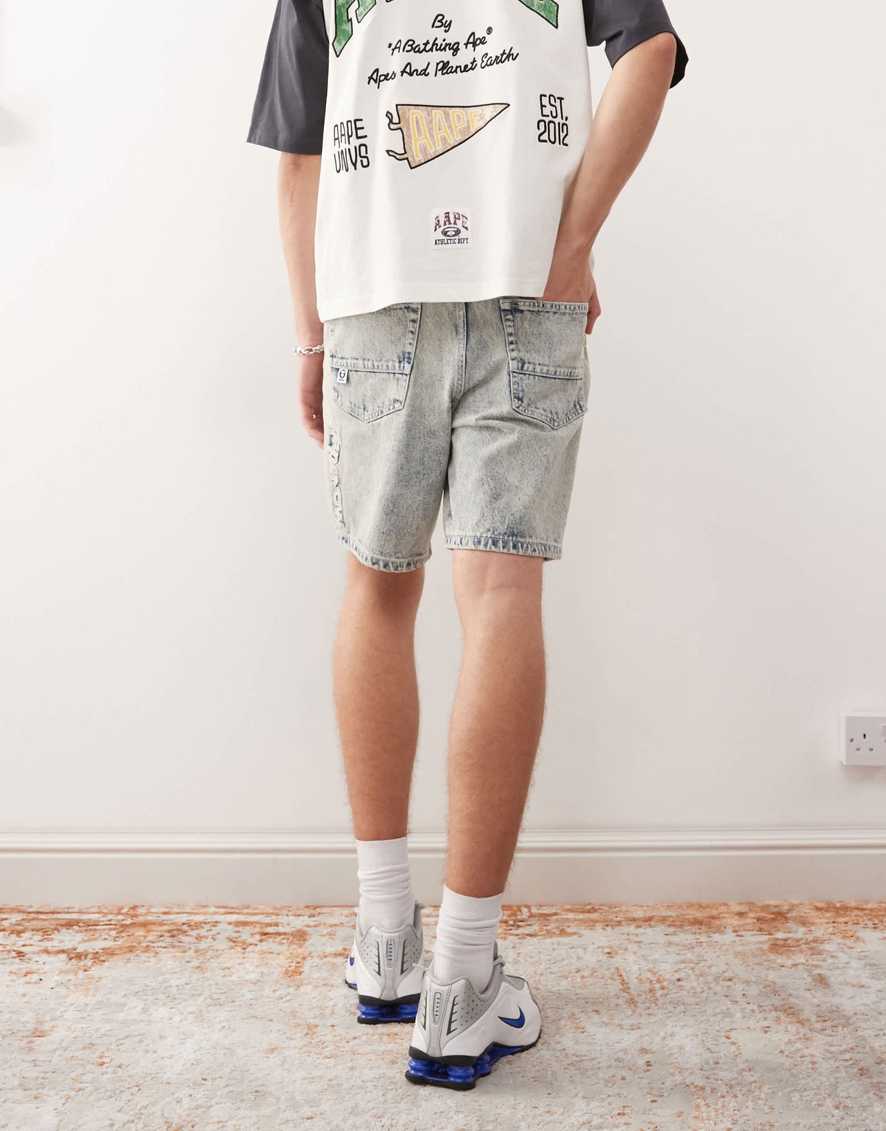 Aape by A Bathing Ape logo denim shorts in light wash